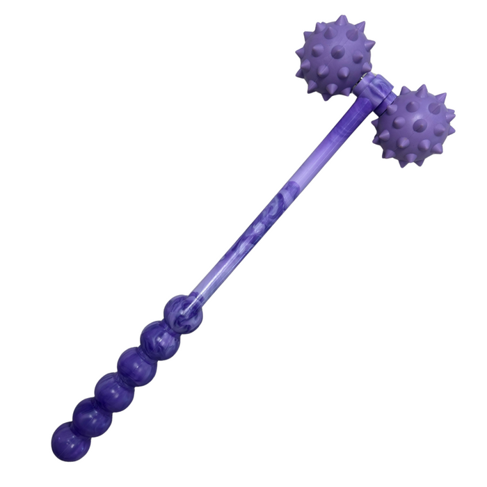 Purple massage tool with ball and spike design on a white background